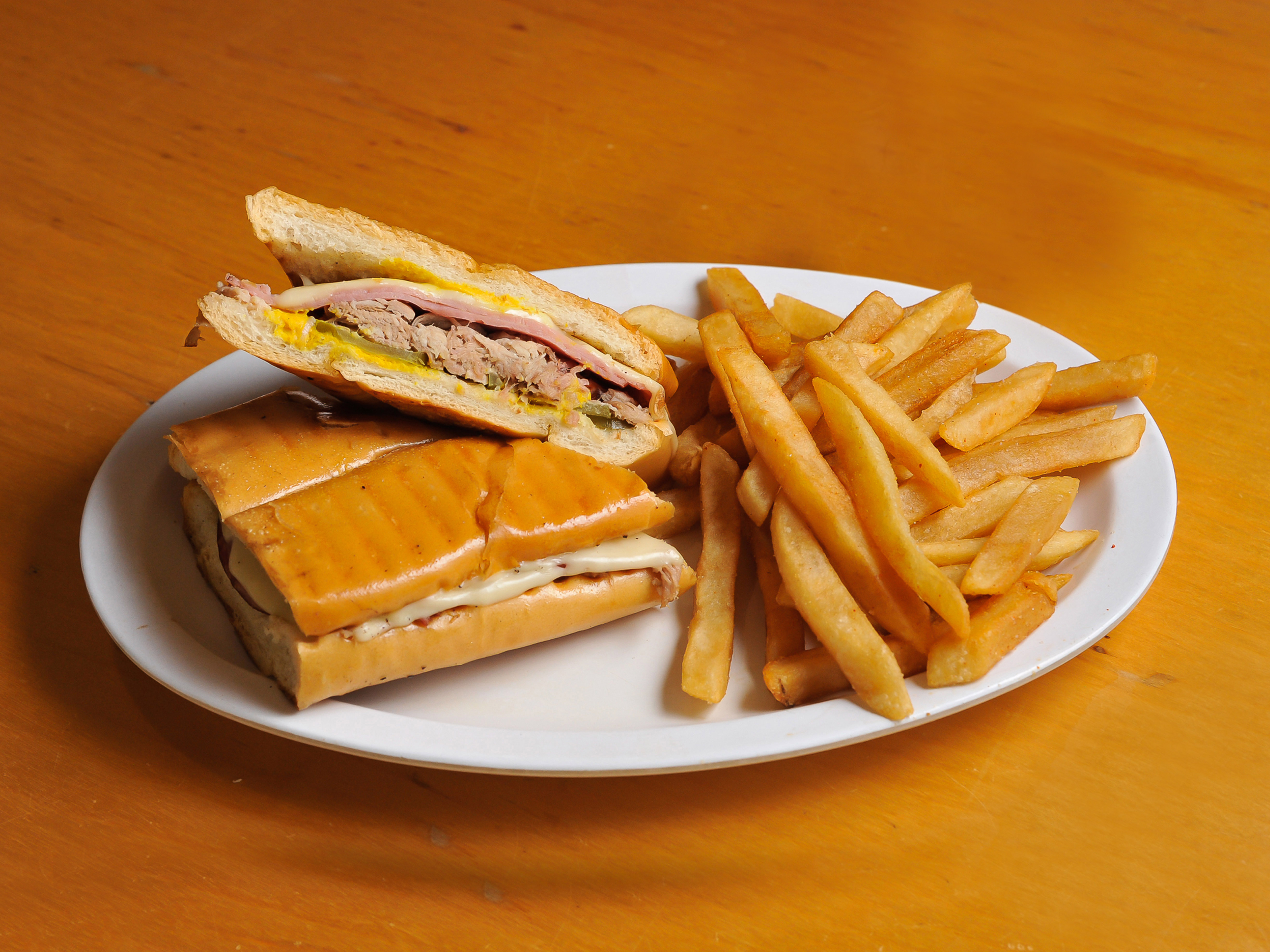 Order The Smokehouse Cuban Sandwich food online from J Miller's Smokehouse store, Woodstock on bringmethat.com