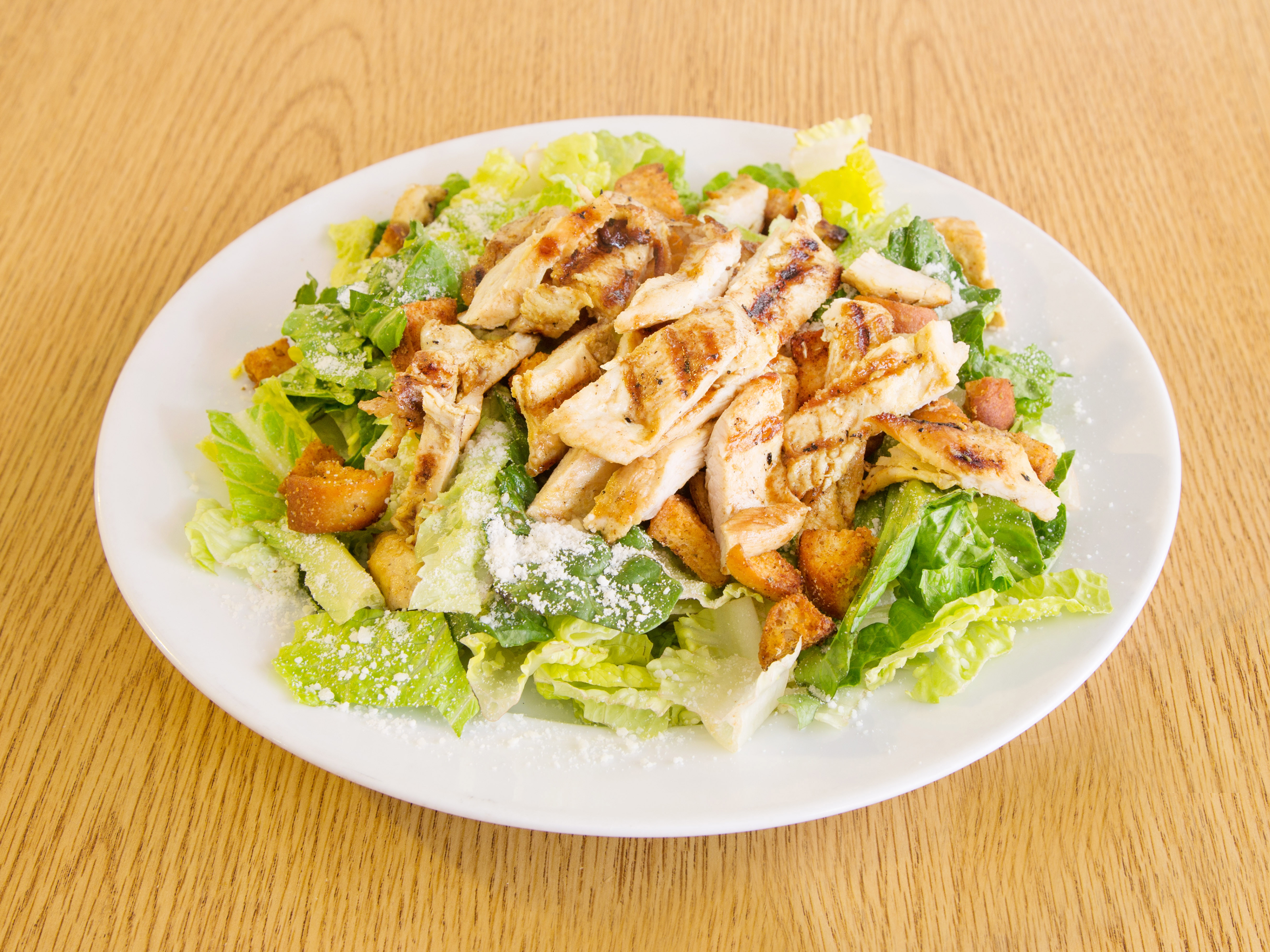 Order Caesar Salad food online from New Pizza On the Block store, West New York on bringmethat.com