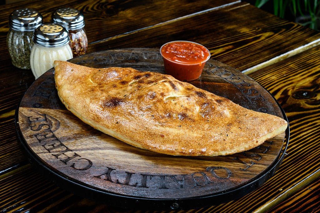 Order Pepperoni Calzone - Calzone food online from Flamez wood fired pizza store, Blackwood on bringmethat.com