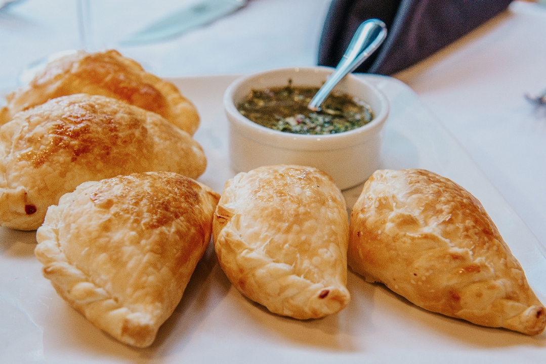 Order Empanadas 12 Cuts vegetable or Cheese (each) food online from 12 Cuts Brazilian Steakhouse store, Dallas on bringmethat.com