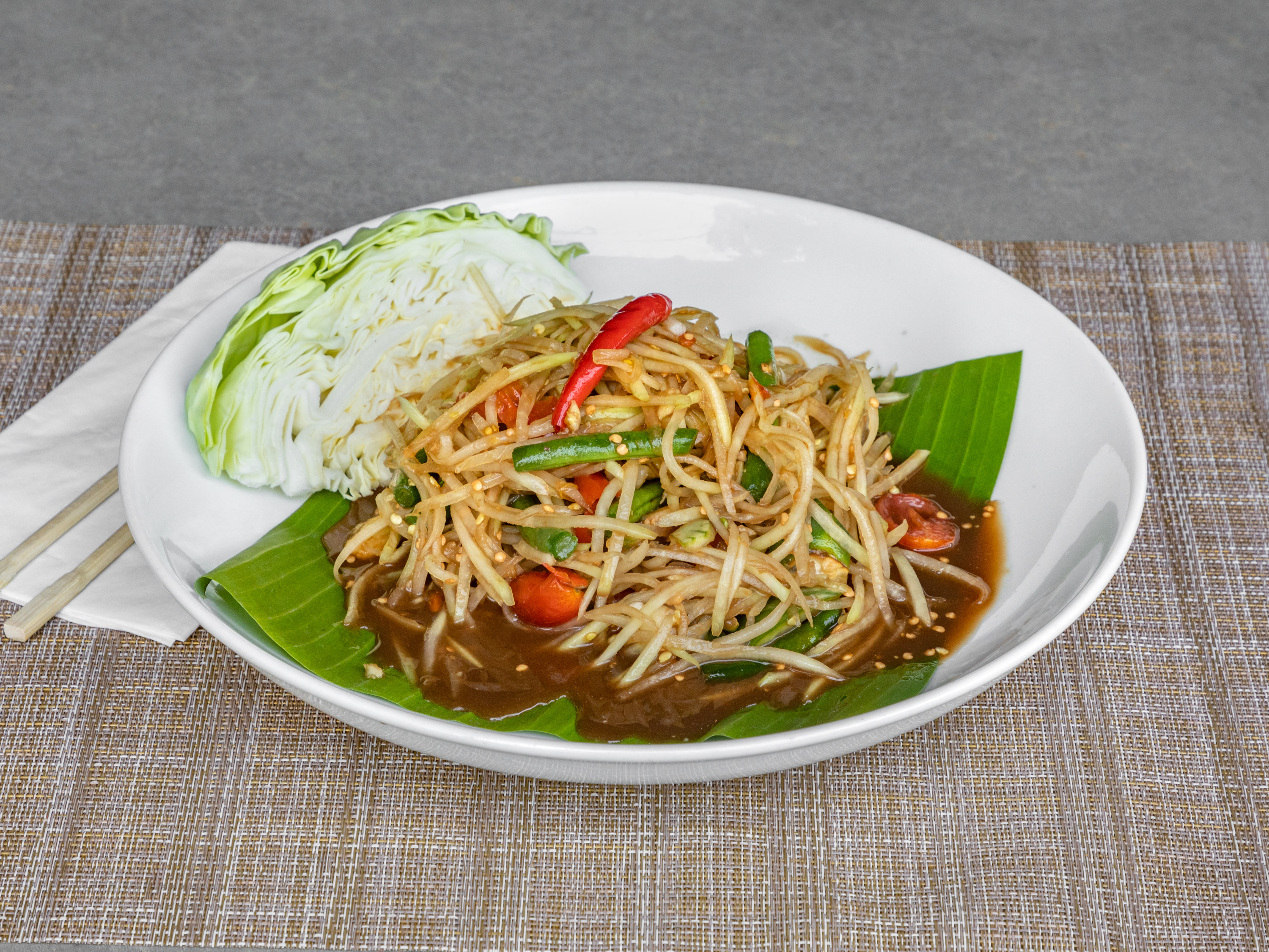 Order 28. Som Tum Salad food online from Phuket Thai Restaurant store, Redondo Beach on bringmethat.com