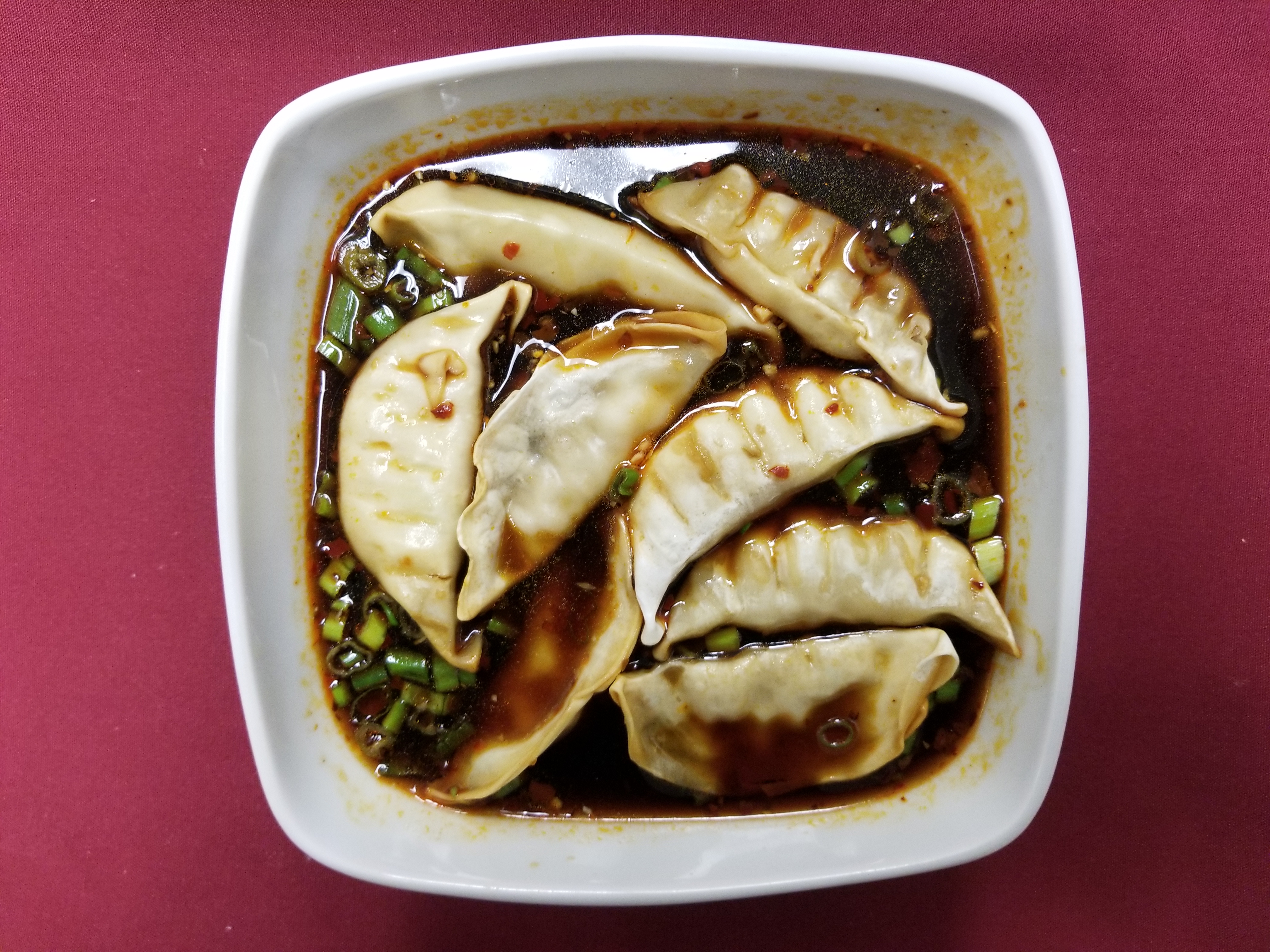 Order 5. Eight Uncle Tsai's Spicy Dumplings food online from Tsai's Chinese Bistro store, Albuquerque on bringmethat.com