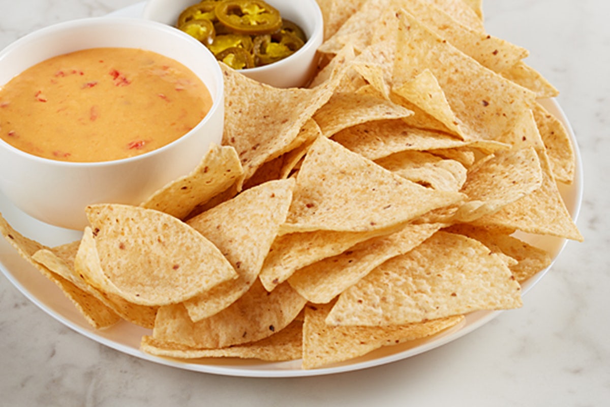 Order Nacho Basket food online from McAlister's Deli store, Fayetteville on bringmethat.com