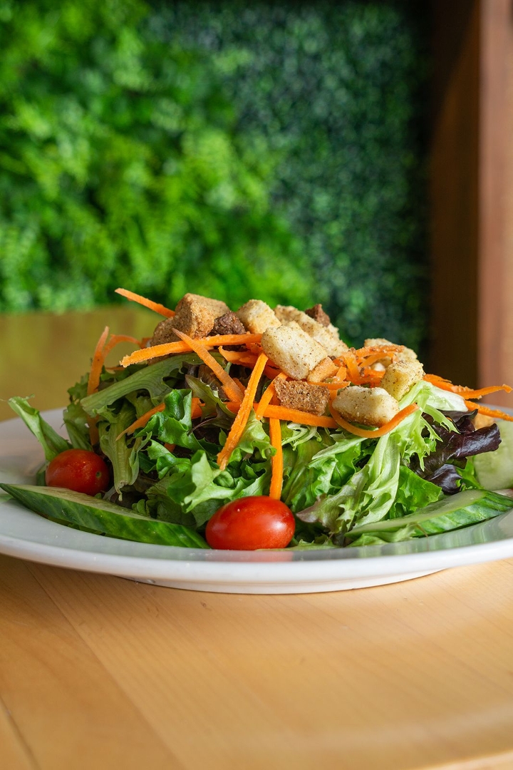 Order Half Greens Salad (V) food online from Blue Water Grill store, Grand Rapids on bringmethat.com