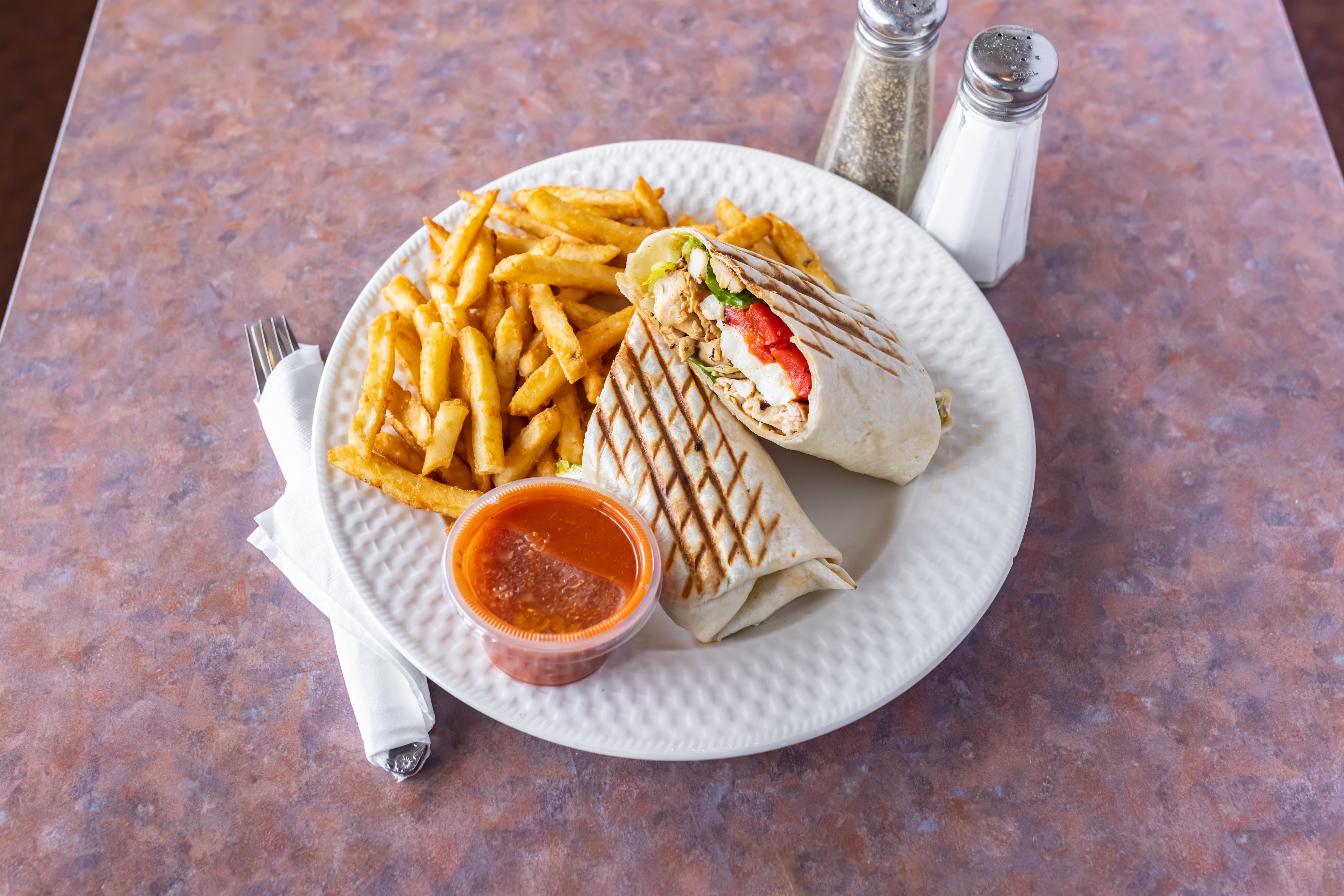 Order Caprese Wrap - Wrap food online from Frank's Pizza & Italian Restaurant store, Blairstown on bringmethat.com