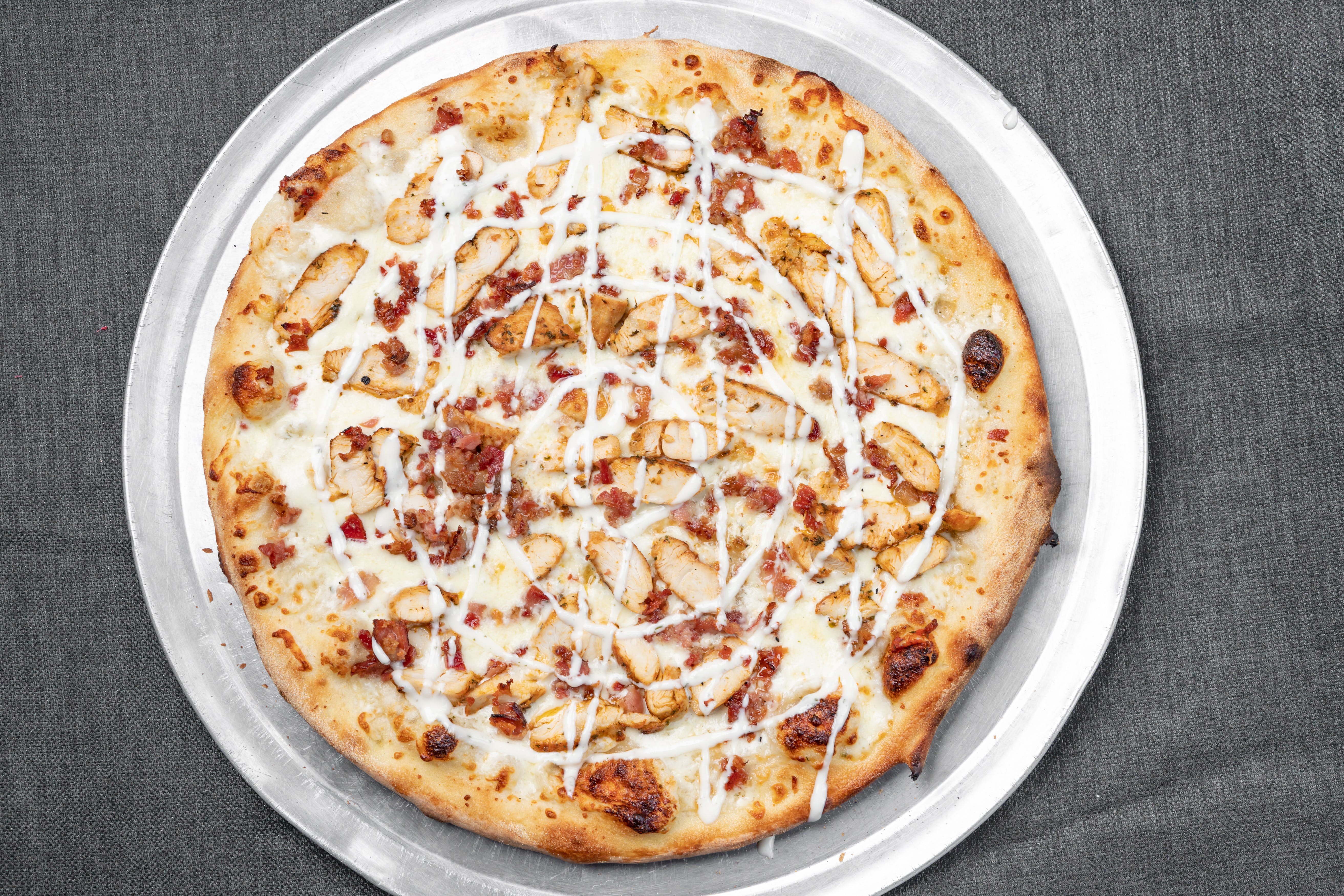 Order Chicken Bacon Ranch Pizza - Medium 12'' food online from The Avenue Grille and Pizzeria store, Dorchester on bringmethat.com