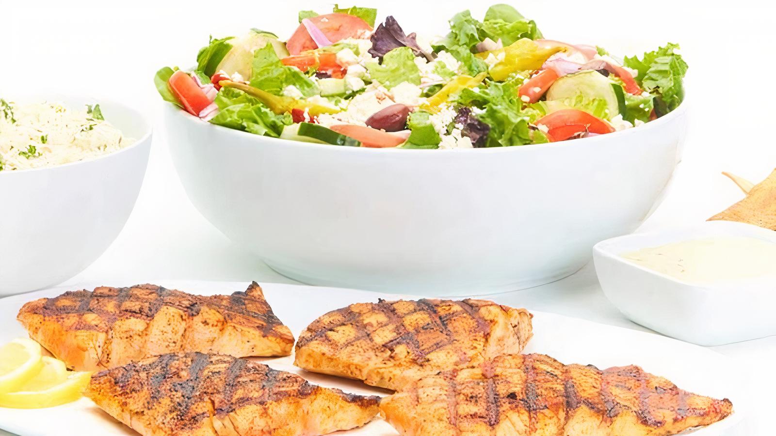 Order Grilled Salmon Family Feast for 4 food online from Taziki Cafe store, Tuscaloosa on bringmethat.com