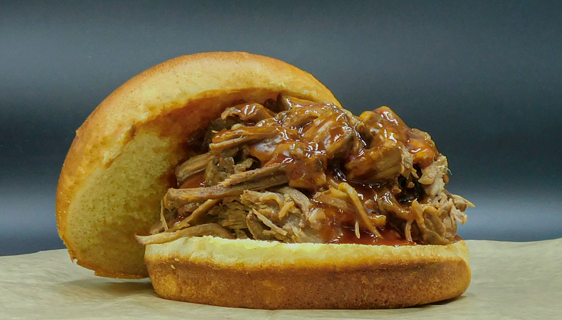 Order BBQ Pulled Beef Sandwich food online from Pit Rib House store, Hickory Hills on bringmethat.com