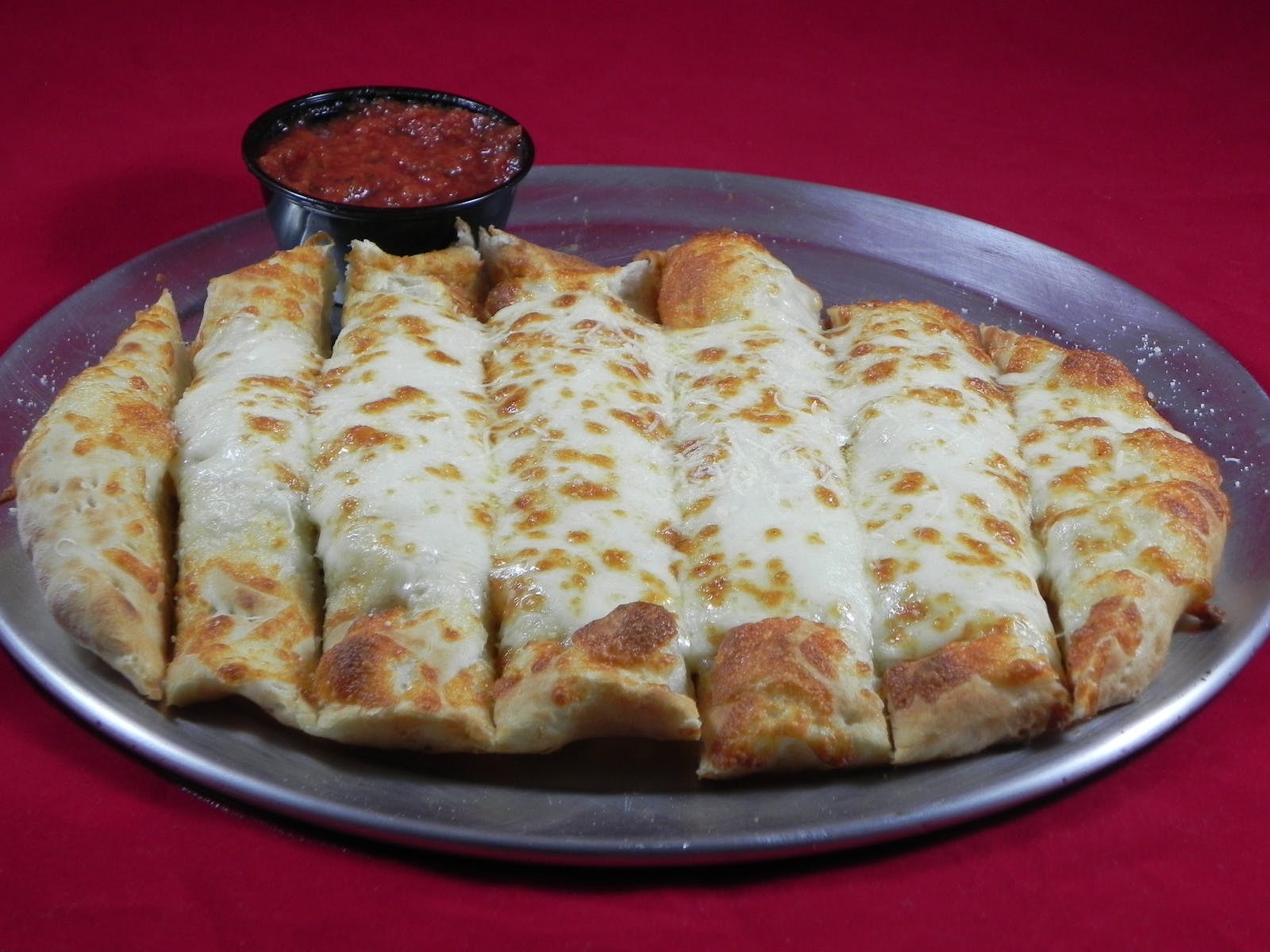 Order Cheesy Breadsticks - Appetizer food online from Tomatoes store, Carnegie on bringmethat.com