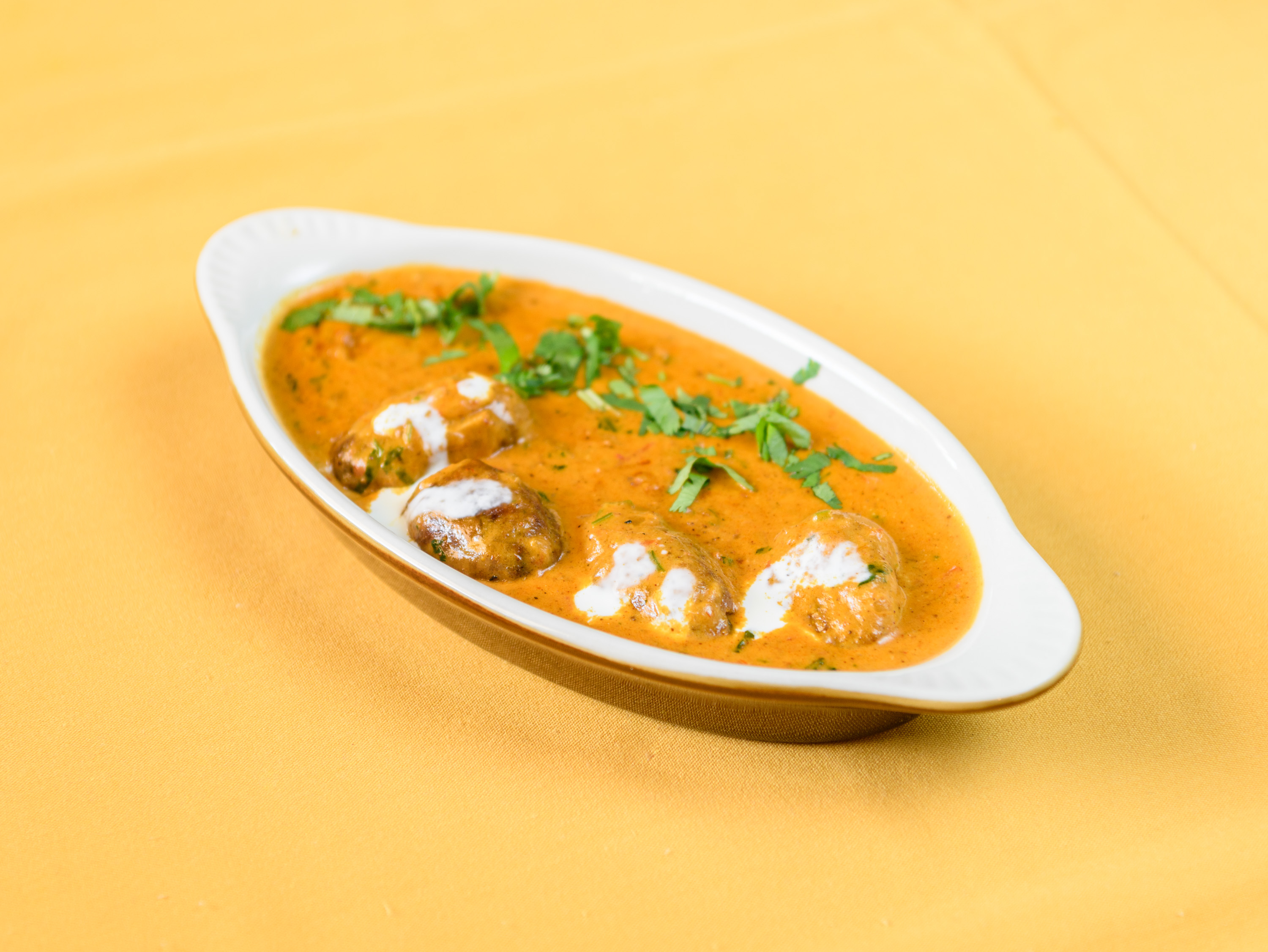 Order Malai Kofta food online from Taj Cuisine of India store, Oklahoma City on bringmethat.com