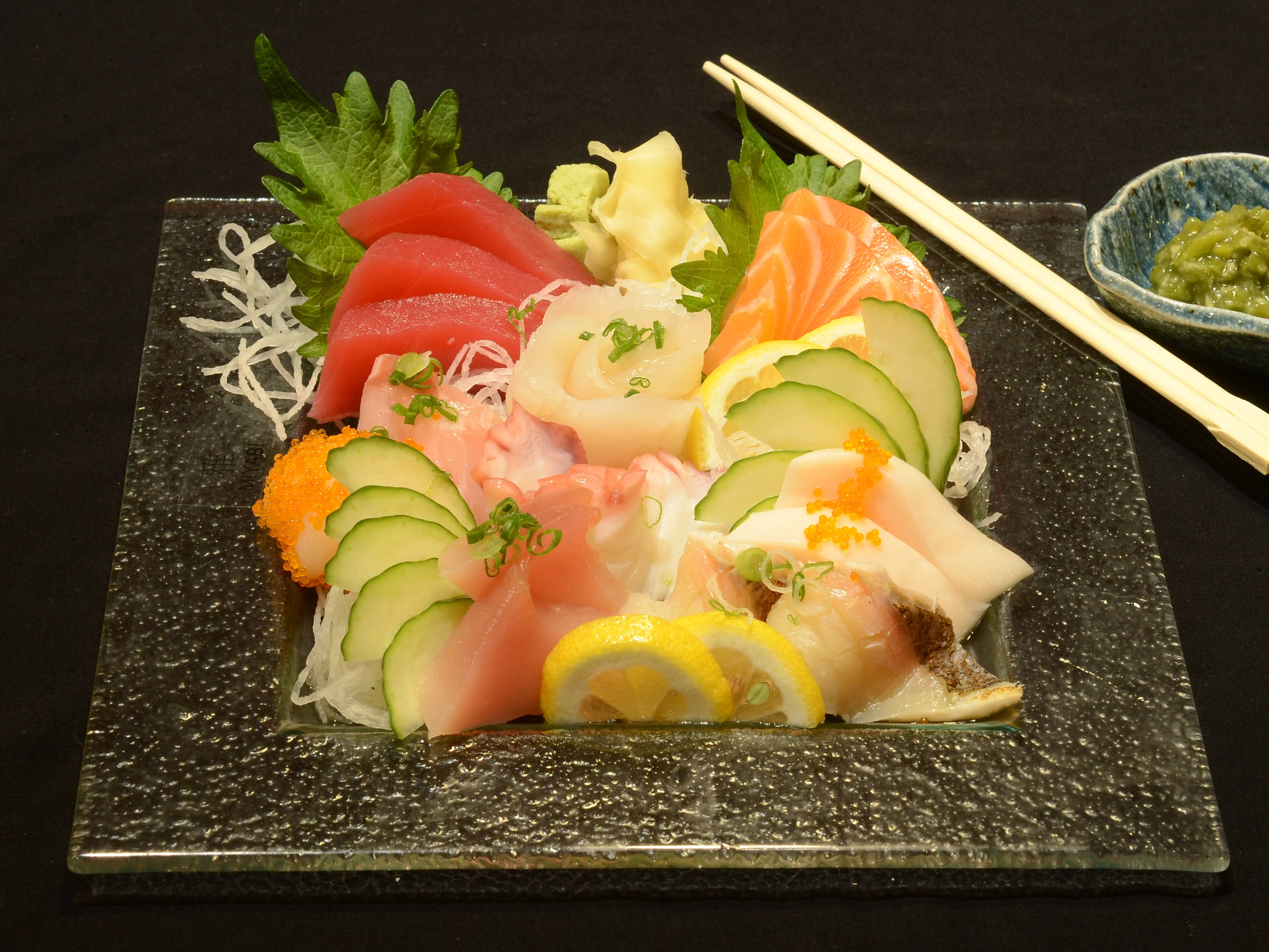 Order 18 Pieces Sashimi Deluxe food online from Yoshio Sushi store, El Cerrito on bringmethat.com
