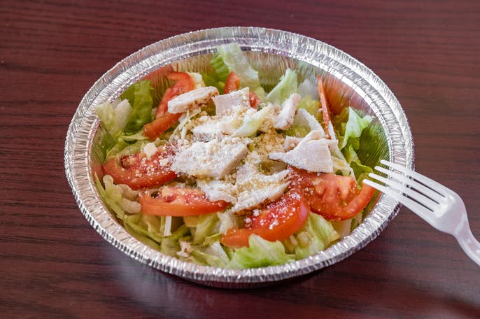 Order 12" Chicken Caesar Salad food online from LA Pizza store, Victorville on bringmethat.com