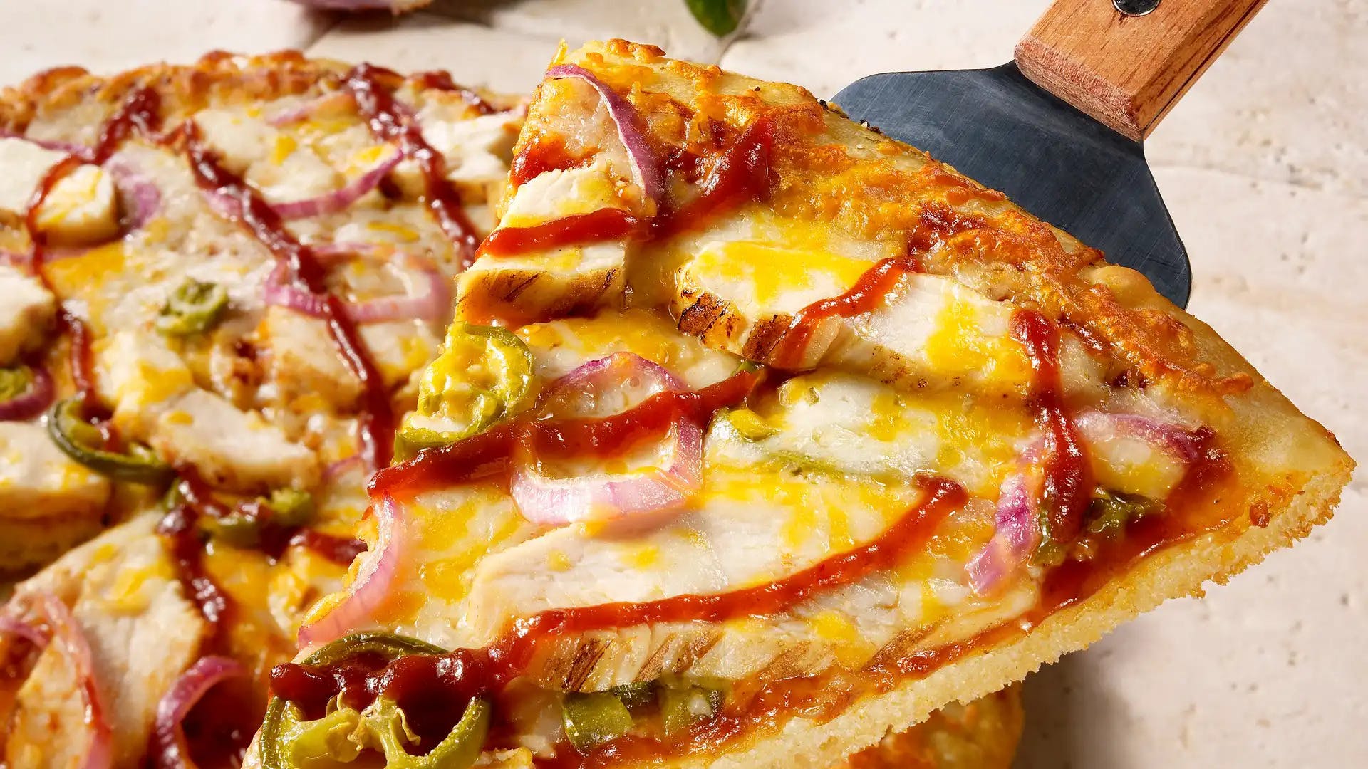 Order BBQ Chicken & Jalapeno Pizza - Pizza food online from Schlotzsky's store, Madison on bringmethat.com