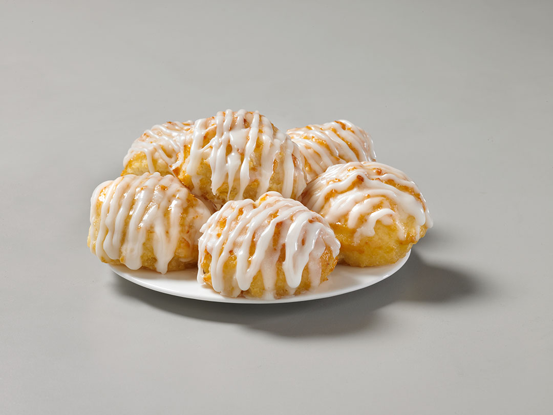 Order Frosted Honey-Butter Biscuits 4 food online from Church's Chicken store, Lufkin on bringmethat.com