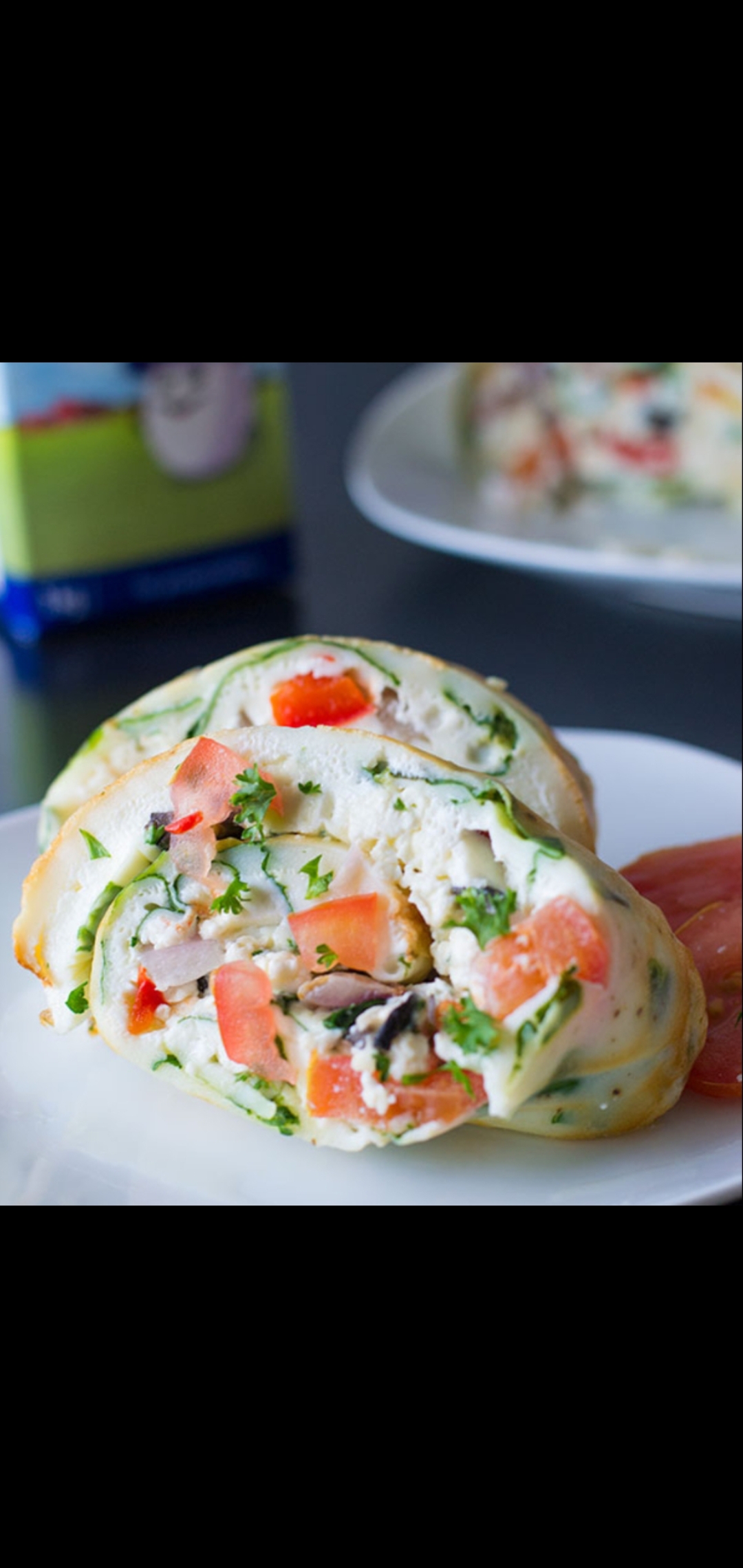 Order Greek Egg Whites Wrap (four egg whites olives feta cheese tomatoes spinach & red onions) food online from American Gourmet Foods Deli store, New York on bringmethat.com