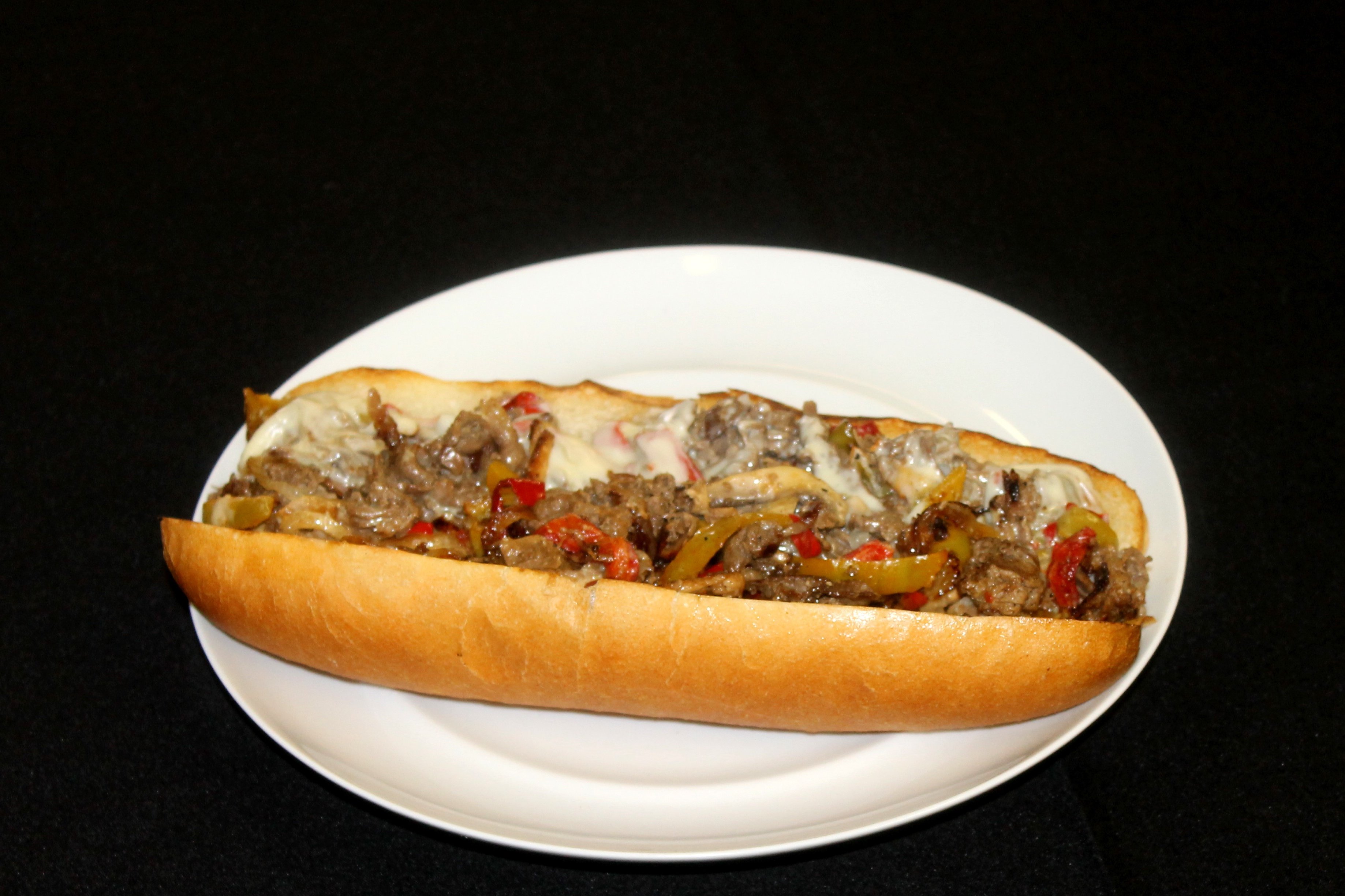 Order Philly Steak Sub food online from Dolce Vita World Bistro store, Syracuse on bringmethat.com