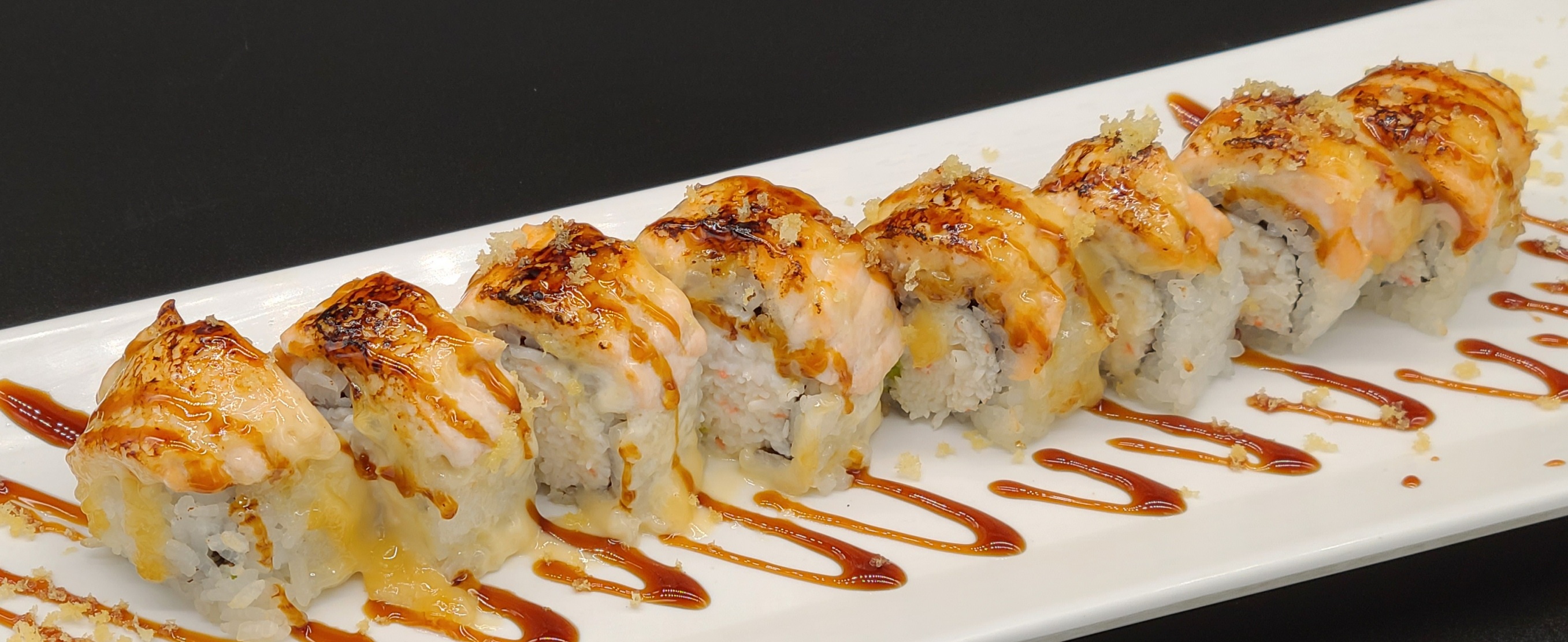 Order B2. Baked Salmon Roll(8pcs) food online from Hello Sushi store, Fullerton on bringmethat.com