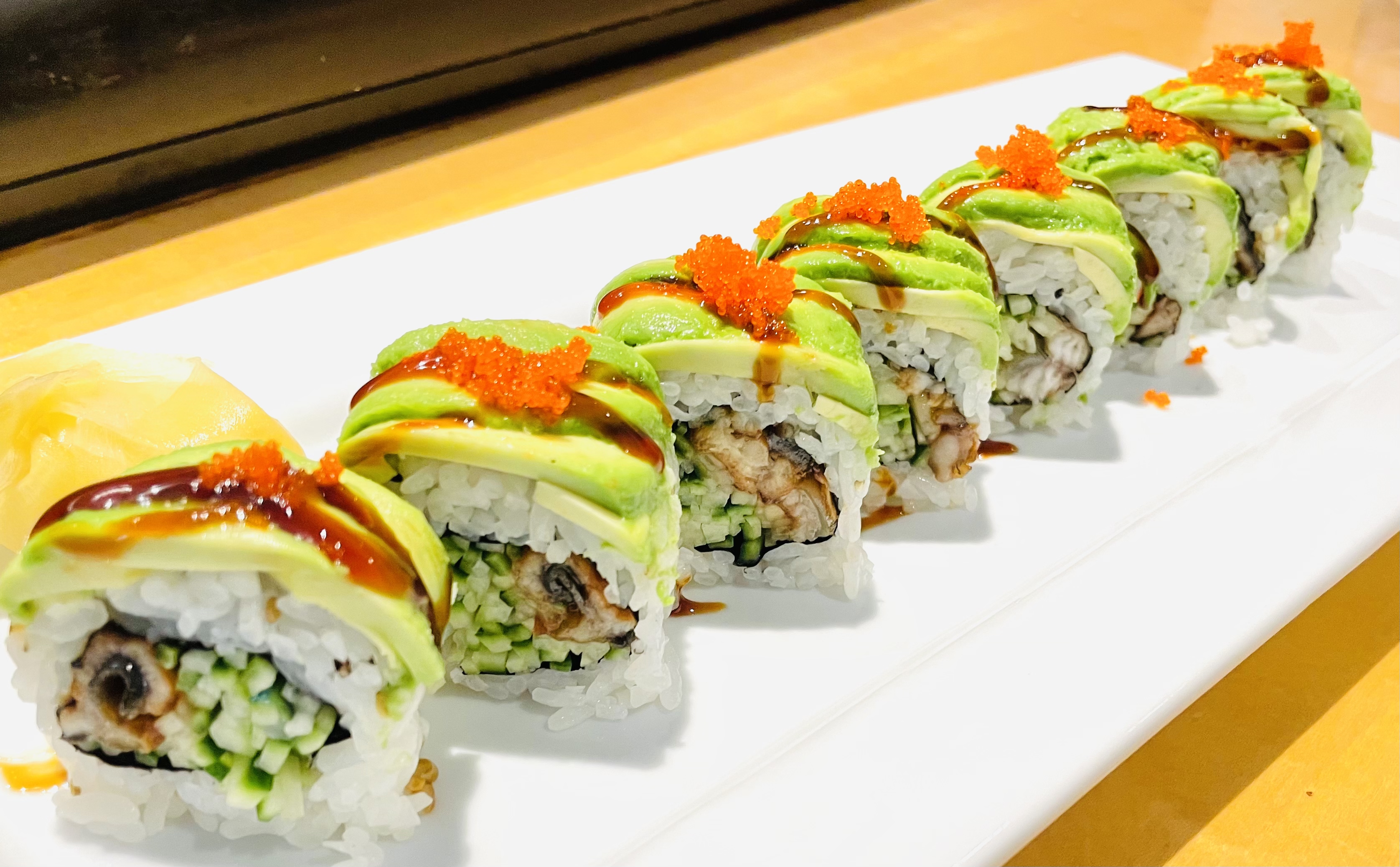 Order Dragon Roll (8 pcs) food online from Rainbow Sushi store, Germantown on bringmethat.com