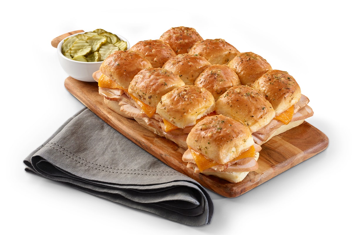 Order Turkey & Cheddar Slider 12-Pack food online from The HoneyBaked Ham Company store, Baton Rouge on bringmethat.com