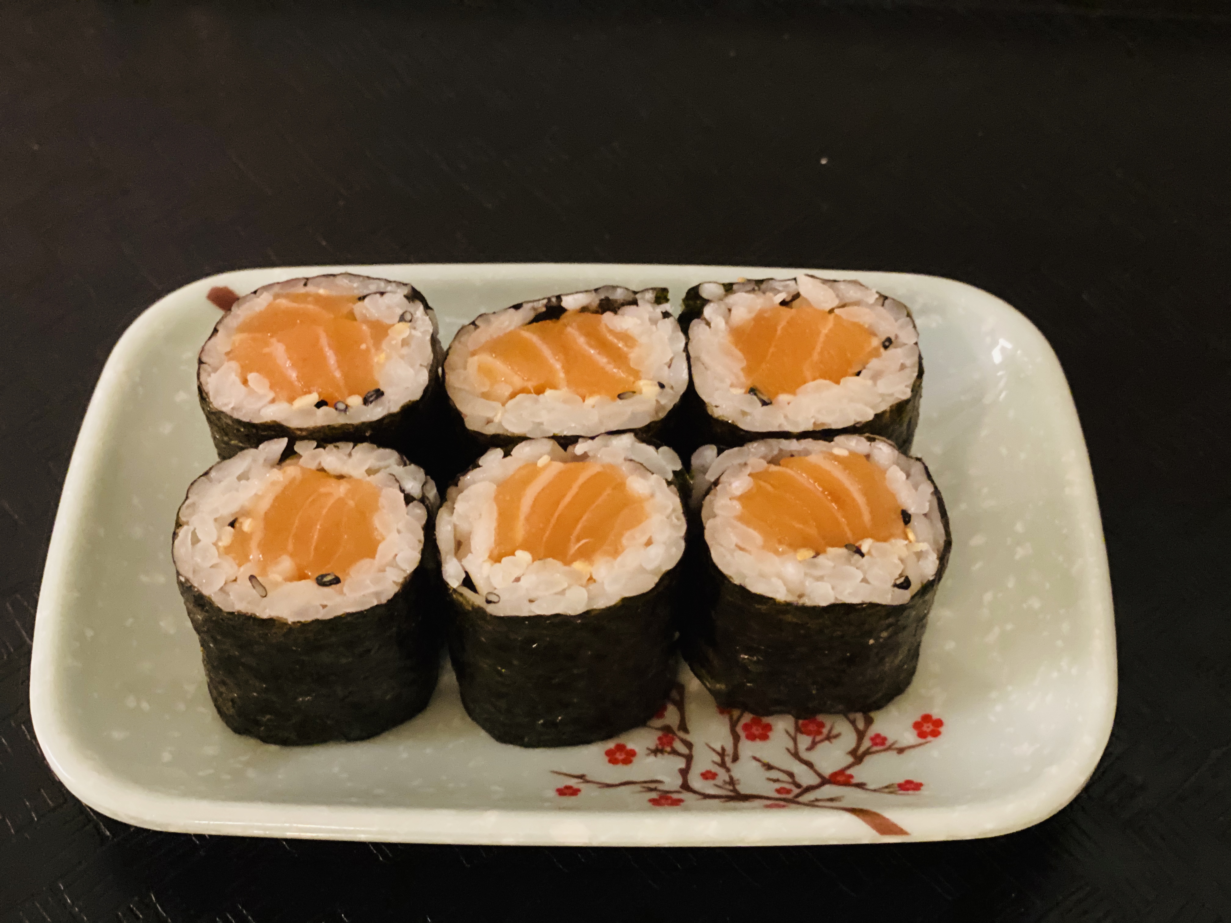 Order 63. Salmon Roll 三文鱼卷 food online from Tengu Sushi store, Newport on bringmethat.com