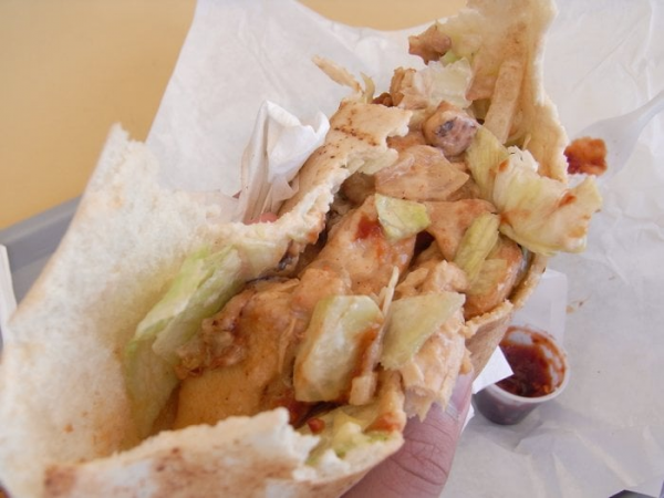 Order Chicken in a Pita food online from Falafel's Drive-In store, San Jose on bringmethat.com