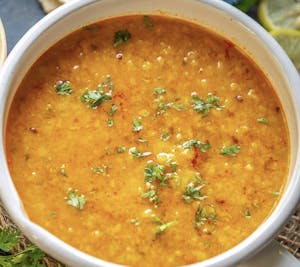 Order Dal Tadka food online from Oasis Multicuisine store, Baton Rouge on bringmethat.com