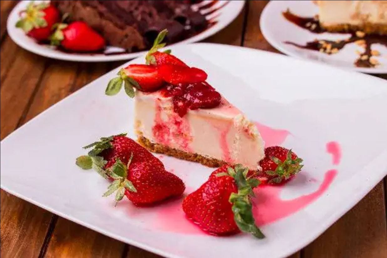 Order Strawberry Cheesecake - Dessert food online from Pizza Fino store, Houston on bringmethat.com