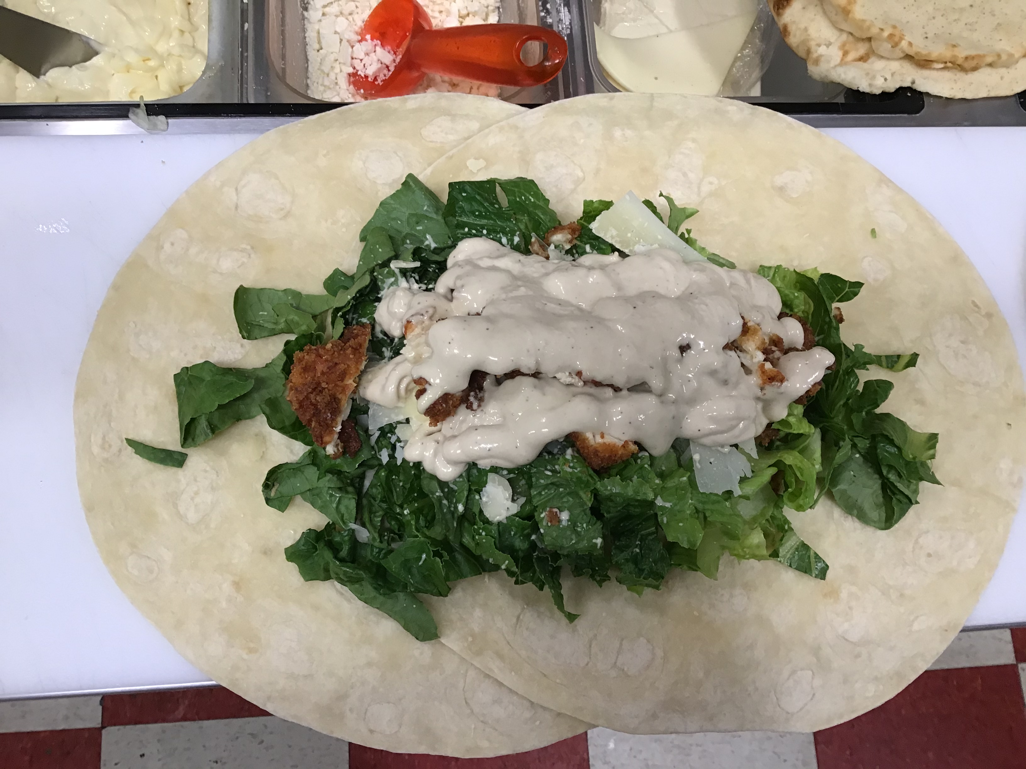 Order Chicken Caesar Wrap food online from Via Roma store, North Conway on bringmethat.com