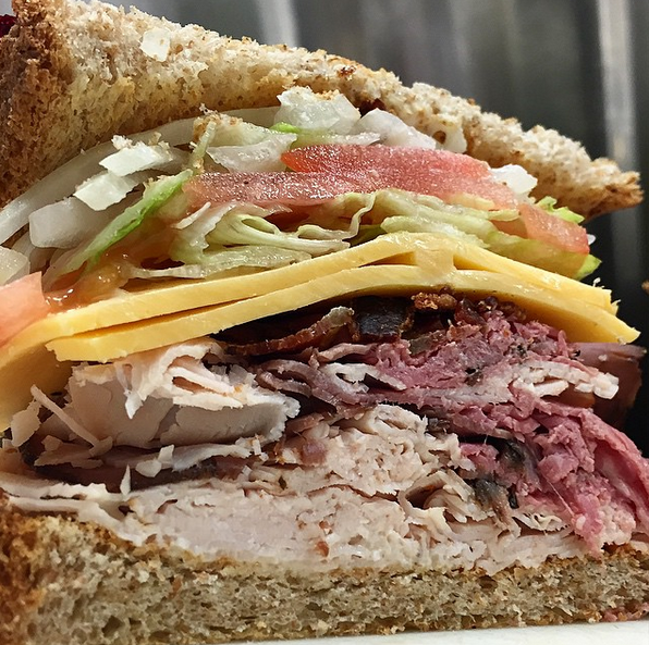 Order Ultimate Club Sandwich food online from Demo Pizzeria & Deli store, Raleigh on bringmethat.com