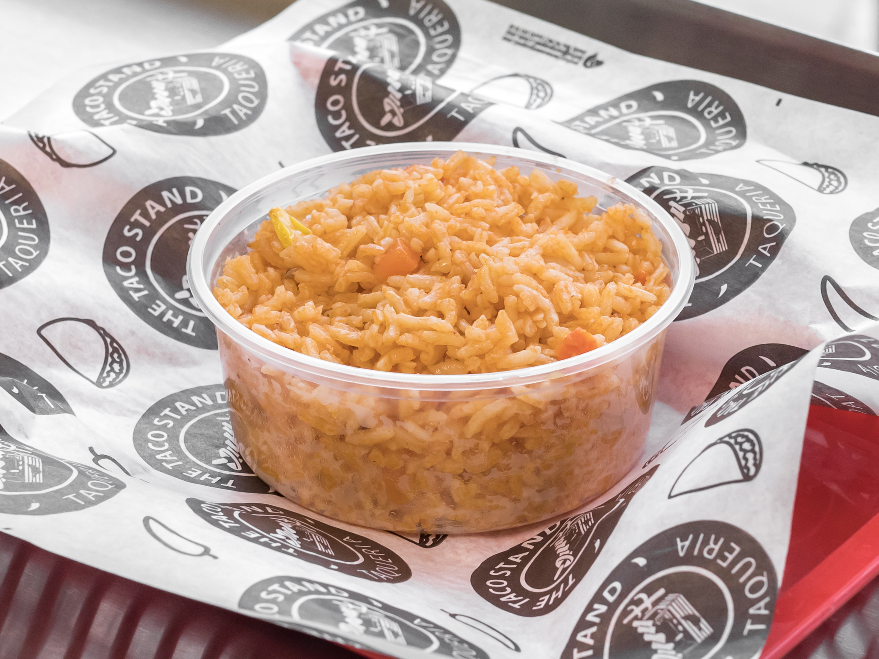 Order 8 oz. Side of Rice food online from The Taco Stand store, Garden City on bringmethat.com