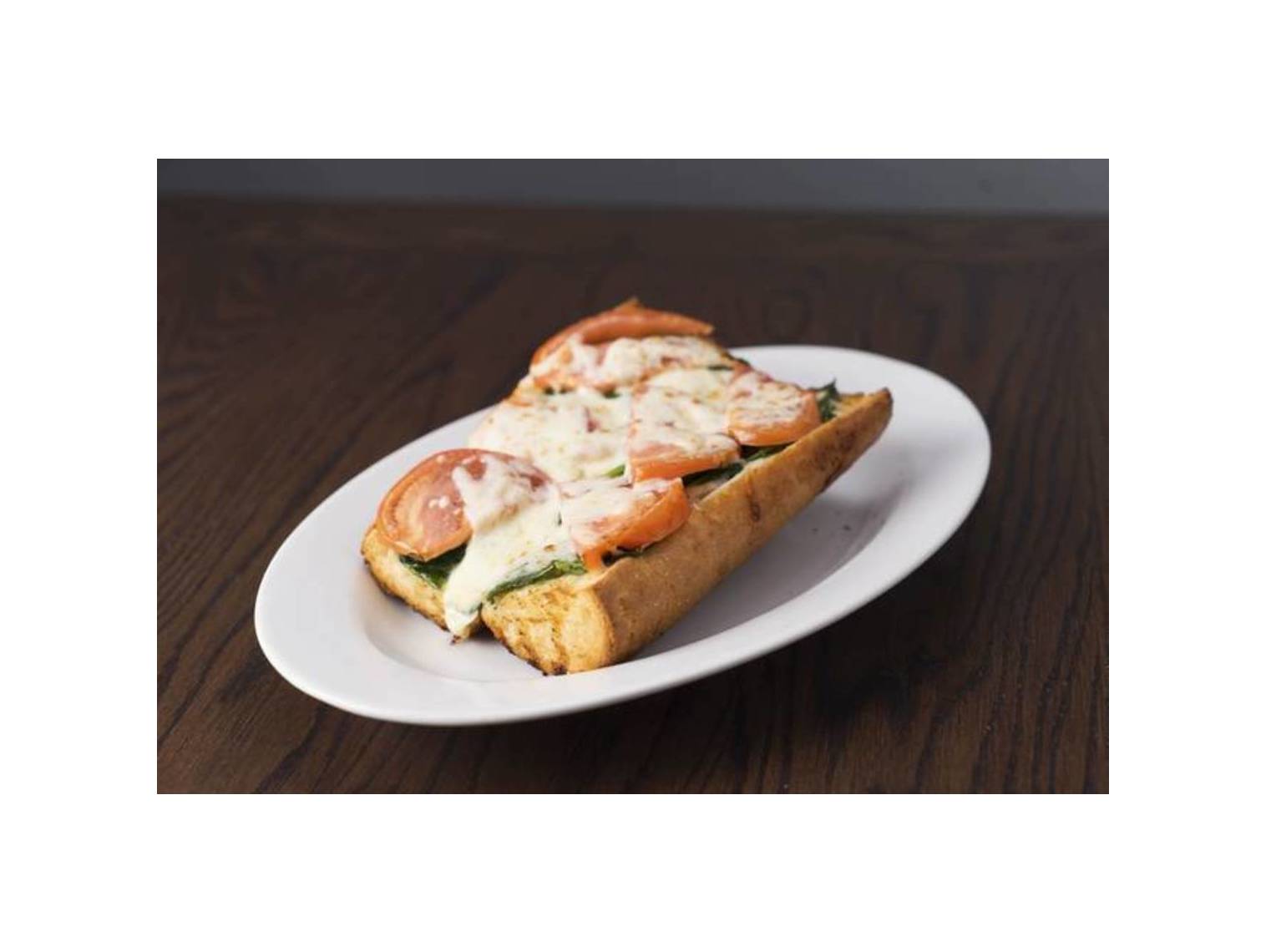 Order Spinach and Tomato Garlic Bread food online from Rosati Pizza store, Milwaukee on bringmethat.com