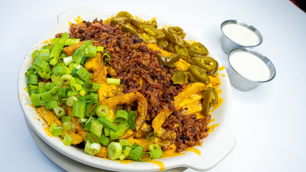 Order Cheddar Fries - Large food online from Snuffer's store, Addison on bringmethat.com