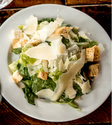 Order Caesar Salad food online from Porter Creek Hardwood Grill store, Fargo on bringmethat.com