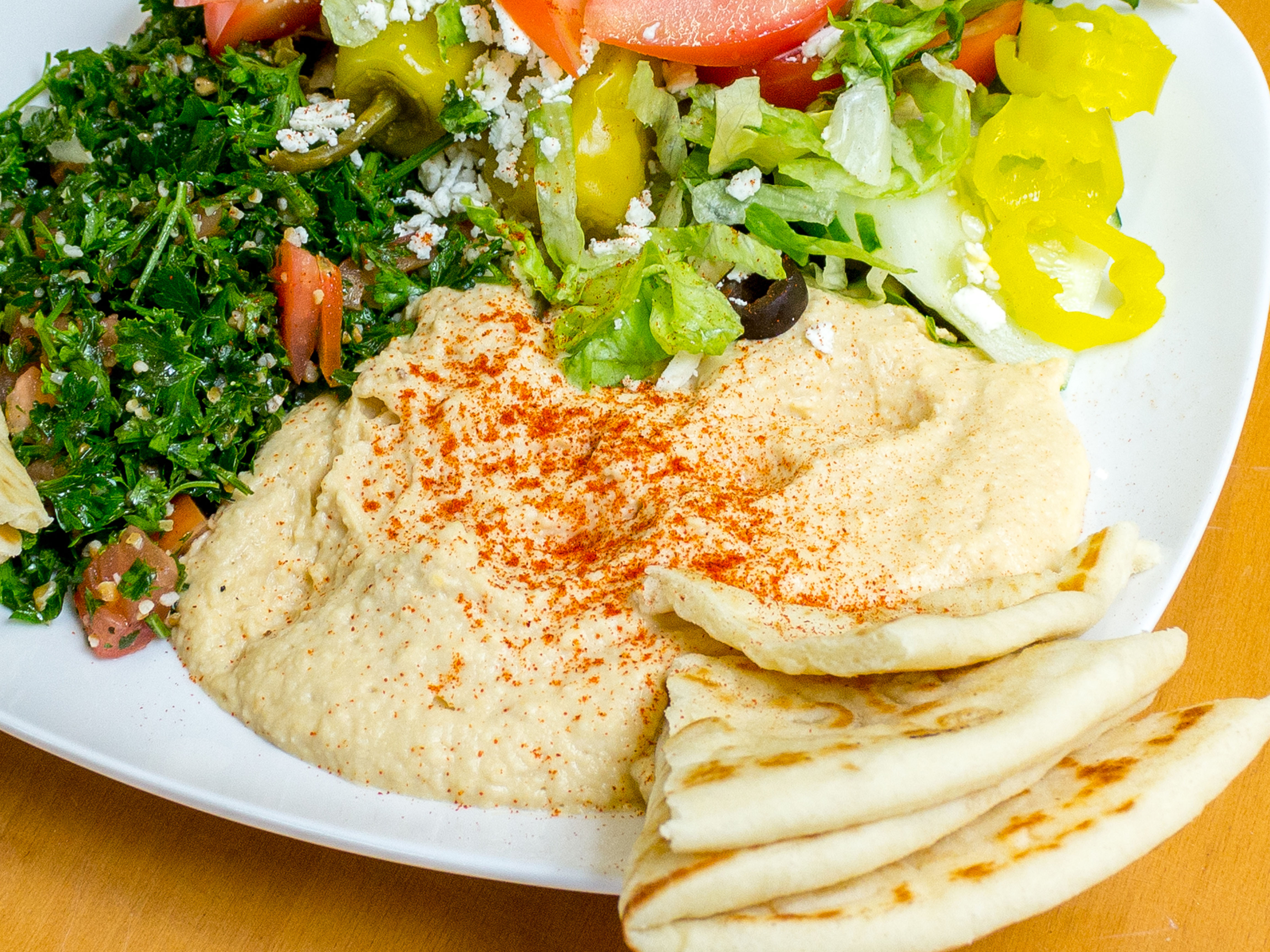 Order A2. Hummus and Tabouli Platter food online from Taza Grill store, Raleigh on bringmethat.com