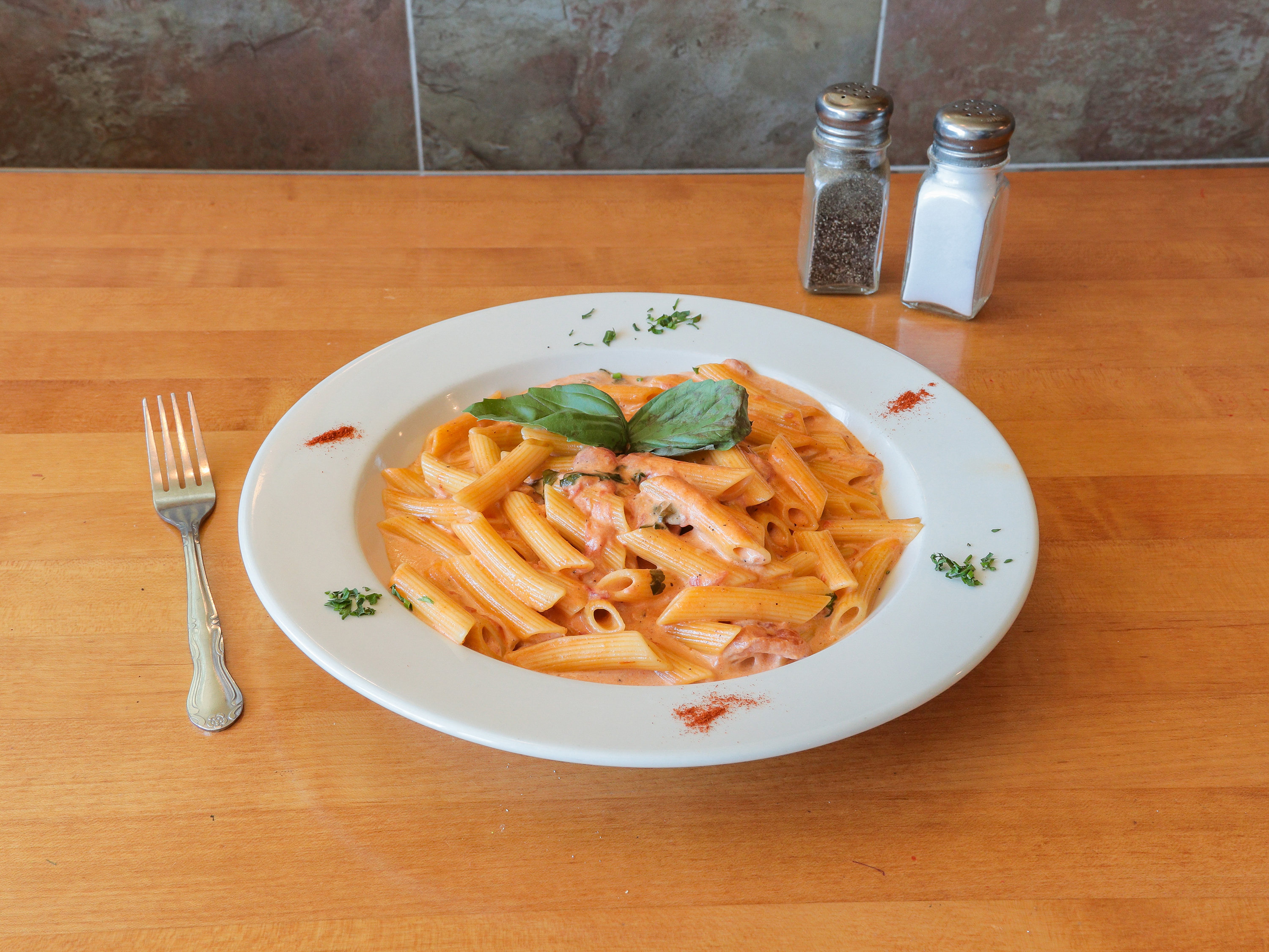Order Penne alla Vodka food online from Franks Trattoria store, Quakertown on bringmethat.com