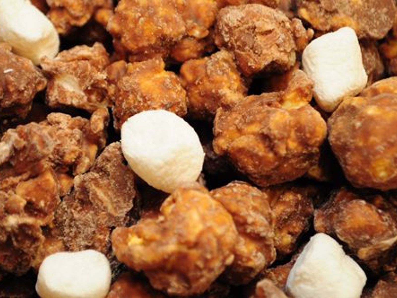 Order ROCKY ROAD food online from Poparazzis Popcorn store, Houston on bringmethat.com