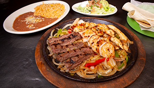 Order Fajitas food online from La Parrilla Mexican Restaurant store, Acworth on bringmethat.com