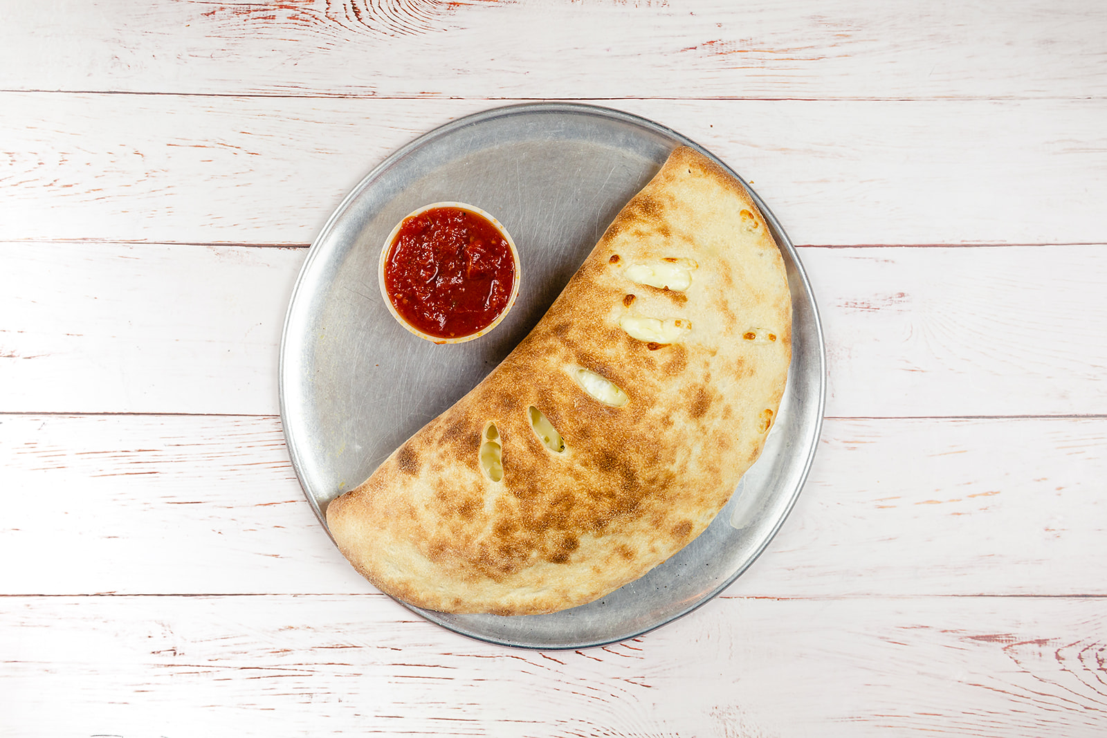 Order Small Calzone food online from Del Rossi's Cheesesteak Co. store, Philadelphia on bringmethat.com