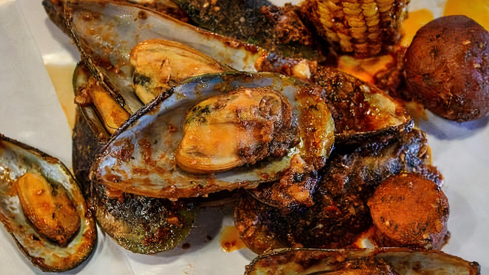 Order Black Mussel food online from The Twisted Crab store, Hampton on bringmethat.com