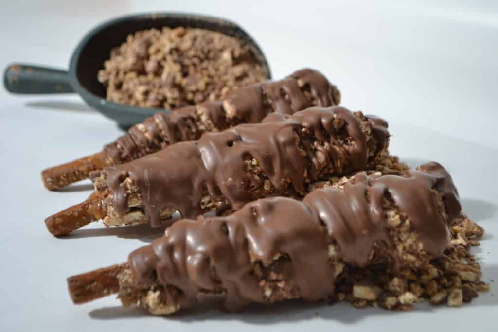 Order Milk Chocolate Covered Snickers® Caramel Pretzel Rod food online from Candy Apple Shoppe store, Glenwood on bringmethat.com