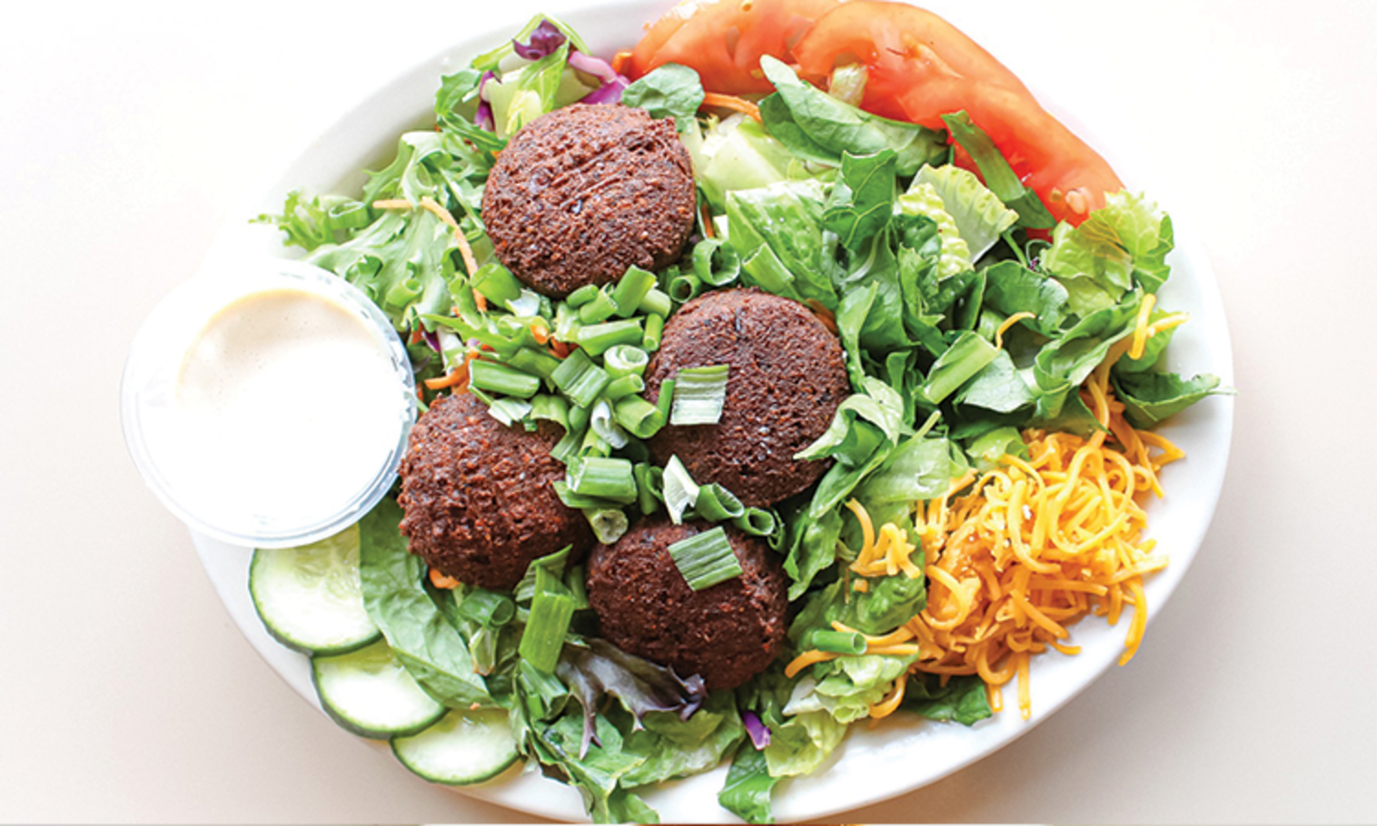 Order Falafel Salad food online from Aladdins eatery store, Akron on bringmethat.com