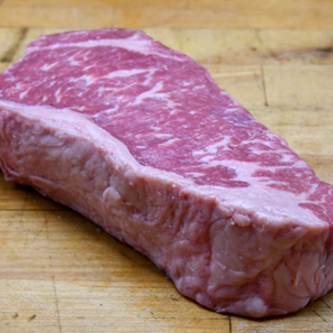 Order 16 oz. Prime Signature Cut New York Strip Butcher's Block food online from Morton The Steakhouse store, Chicago on bringmethat.com