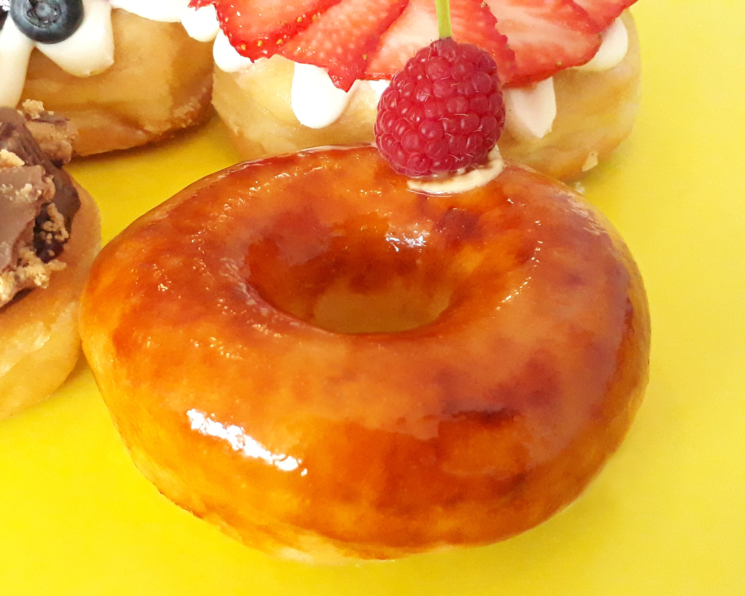 Order Creme Brulee Donut food online from Jaram's Donuts store, Dallas on bringmethat.com