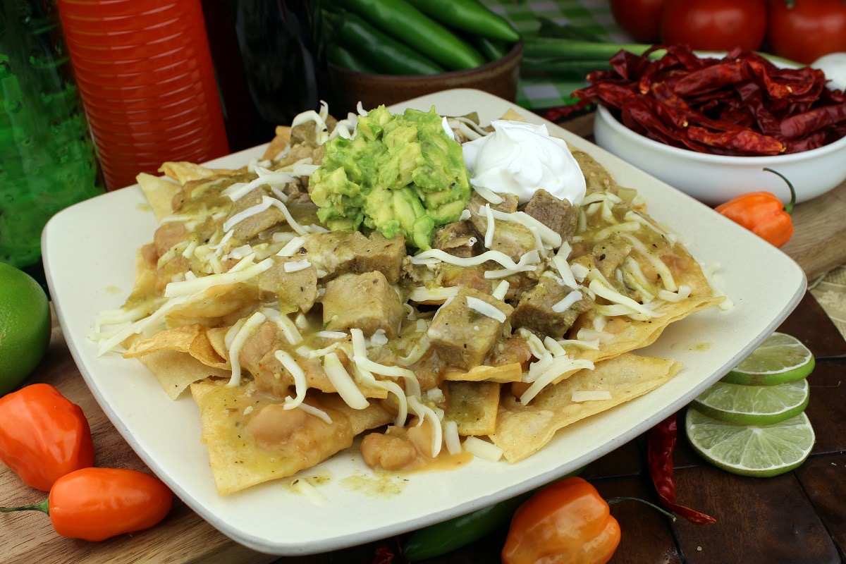 Order Chile Verde Nachos  food online from Chef Ladis Mexican Restaurant store, Pico Rivera on bringmethat.com