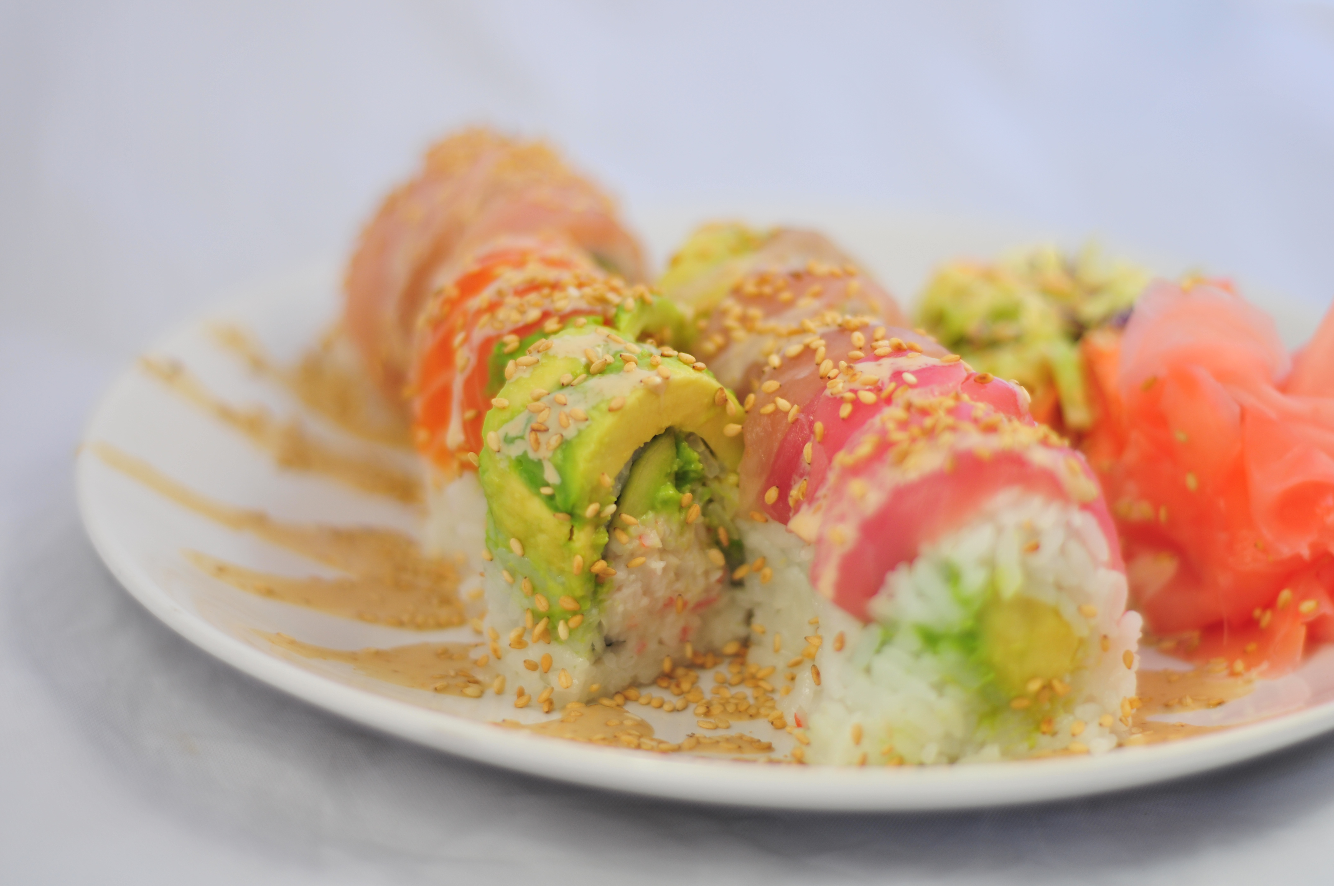 Order 10 Piece Rainbow Roll food online from Sushi Kokku store, Pismo Beach on bringmethat.com