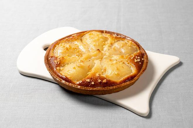 Order Pear & Almond Tart Large food online from Le Pain Quotidien store, Greenwich on bringmethat.com