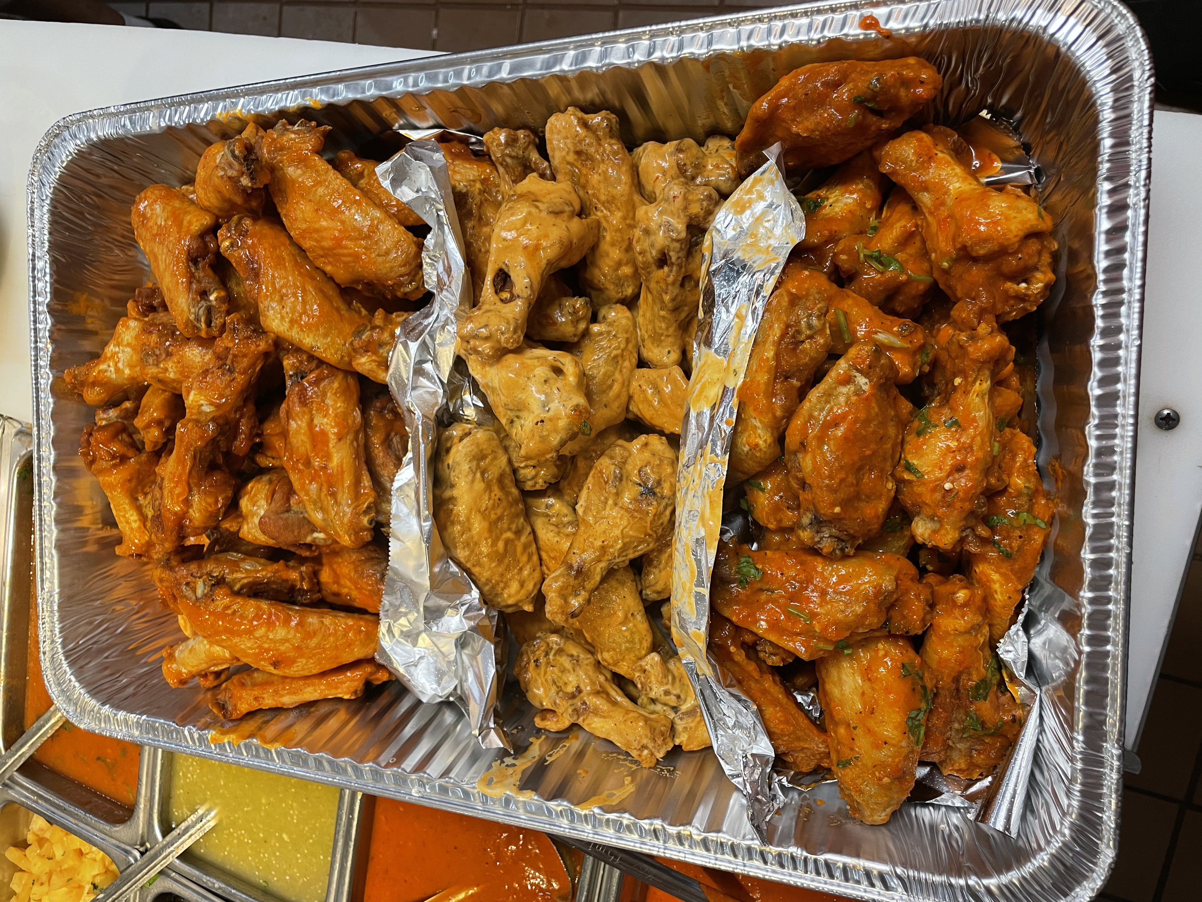 Order 9 pc Caliente Wings  w/ fries food online from Caliente Mexican store, Providence on bringmethat.com