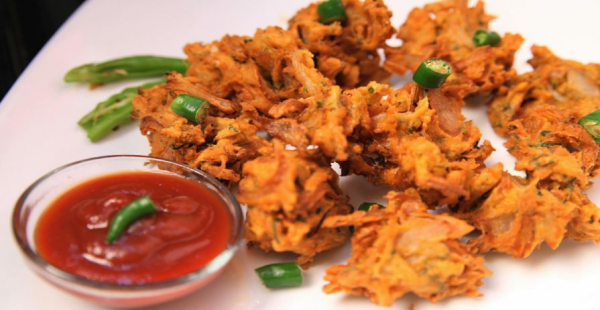 Order Vegetable Pakora food online from Curry India store, New York on bringmethat.com