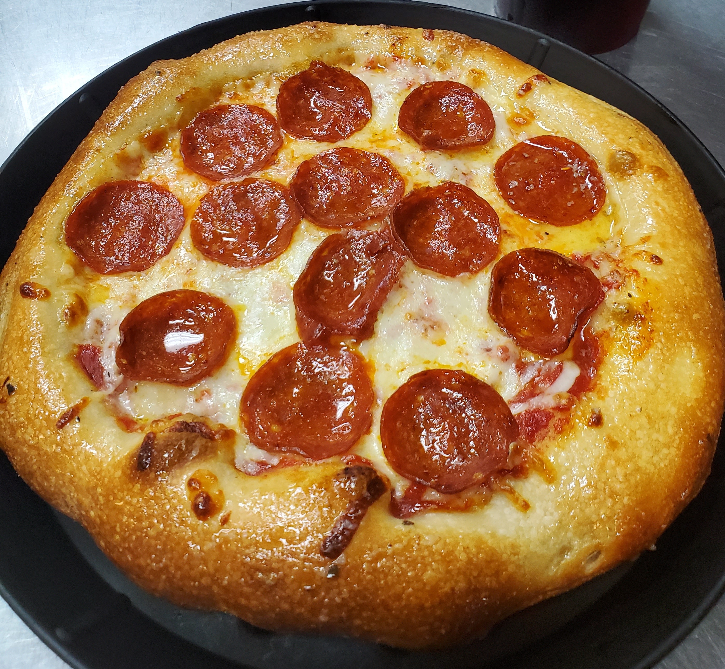 Order 1-Topping Small Pizza & Soft Drink food online from Greek's Pizzeria store, Muncie on bringmethat.com