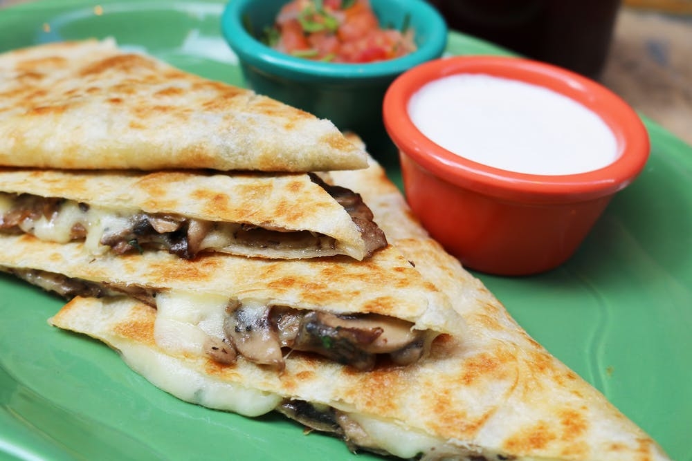 Order Quesadilla De Hongos food online from Mad Dog And Beans store, New York on bringmethat.com